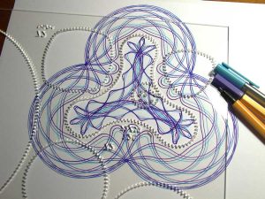 The triangley shape, which you can draw outside or inside. 